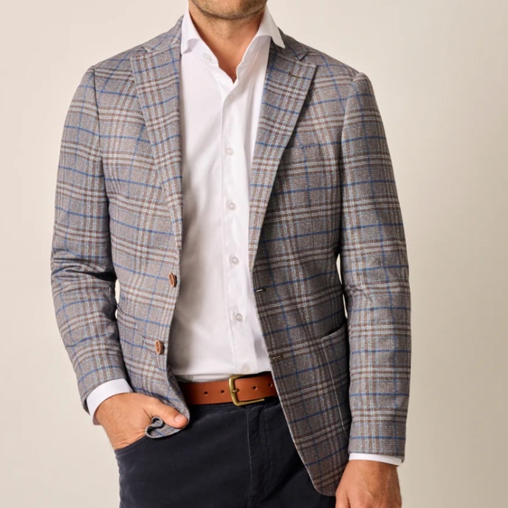 Italian wool blazer in a plaid with an exiting colorful printed lining.